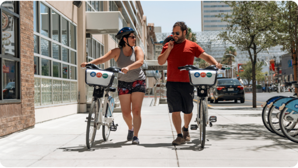 People riding RTC Bike Share bikes
